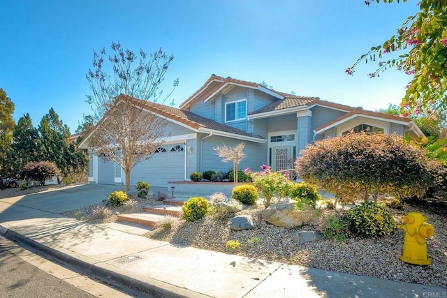 front of property featuring a garage