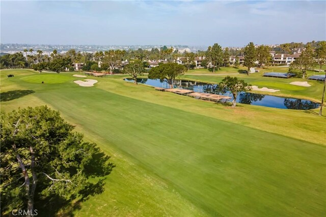 view of home's community with a water view