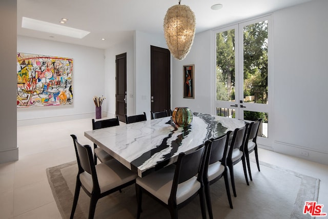 dining space with french doors and plenty of natural light