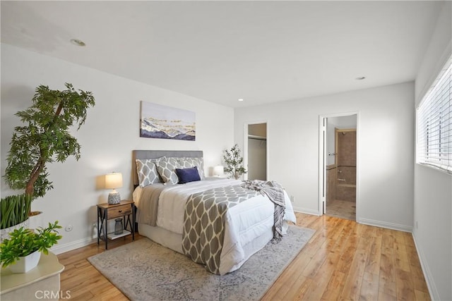 5845 Doverwood Dr Unit 216, Culver City, CA 90230 - bedroom featuring light wood-type flooring, recessed lighting, and ensuite bathroom