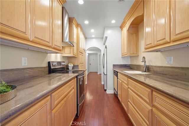 5845 Doverwood Dr Unit 216, Culver City, CA 90230 - kitchen featuring stainless steel appliances, arched walkways, dark wood-style flooring, recessed lighting, and wall chimney range hood