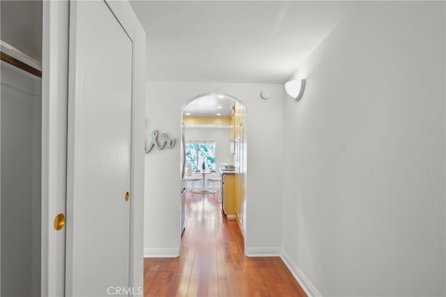 5845 Doverwood Dr Unit 216, Culver City, CA 90230 - hall with arched walkways and wood-type flooring