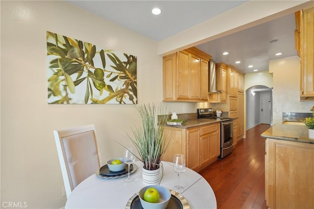 5845 Doverwood Dr Unit 216, Culver City, CA 90230 - kitchen featuring electric range, arched walkways, wall chimney range hood, dark wood-style flooring, and recessed lighting