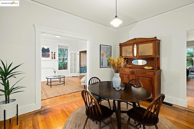 dining room featuring wood-type flooring