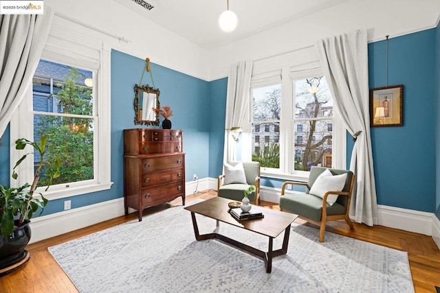 living area featuring hardwood / wood-style floors