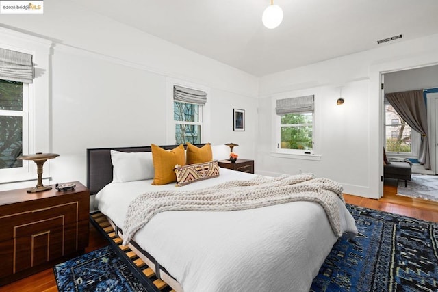 bedroom featuring hardwood / wood-style flooring