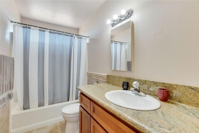 full bathroom featuring vanity, tile patterned flooring, shower / bath combo, and toilet