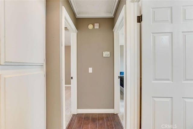 hallway with dark hardwood / wood-style flooring