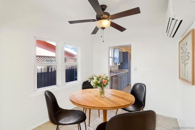 dining room with ceiling fan, sink, and an AC wall unit