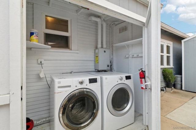 washroom featuring washer and dryer