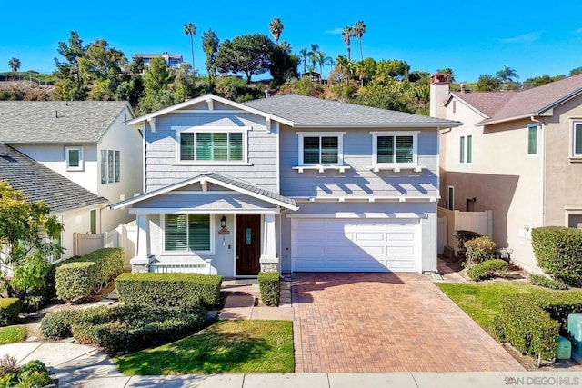 view of front of property featuring a garage