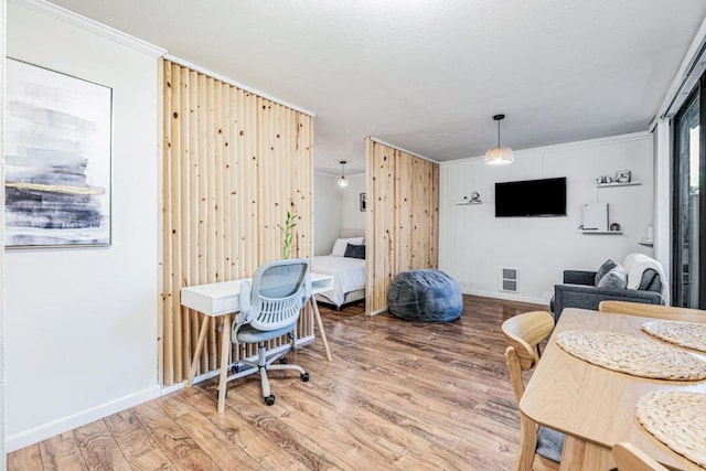 office with light hardwood / wood-style flooring