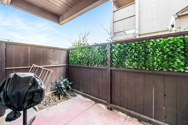 balcony featuring area for grilling and a patio