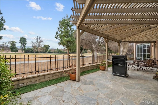 26800 Monet Ln, Valencia, CA 91355 - view of patio / terrace with outdoor dining space, a fenced backyard, a grill, and a pergola
