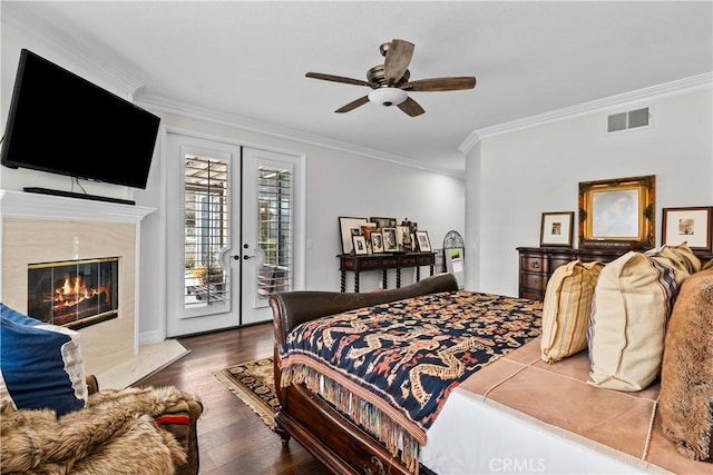 26800 Monet Ln, Valencia, CA 91355 - bedroom featuring visible vents, a premium fireplace, ornamental molding, wood finished floors, and access to exterior