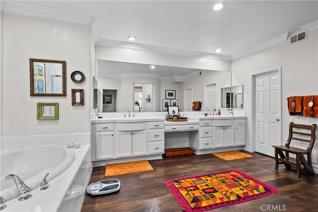 26800 Monet Ln, Valencia, CA 91355 - full bathroom with double vanity, visible vents, wood finished floors, a garden tub, and a sink