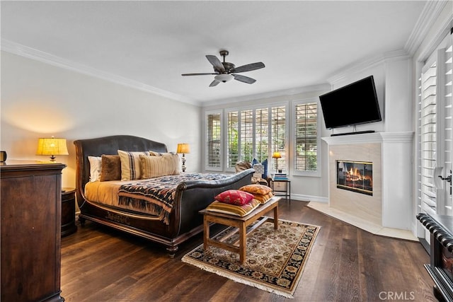 26800 Monet Ln, Valencia, CA 91355 - bedroom with a ceiling fan, dark wood finished floors, crown molding, and a high end fireplace