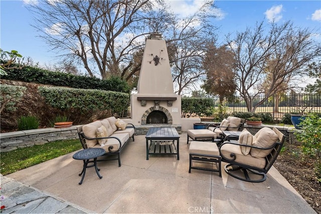 26800 Monet Ln, Valencia, CA 91355 - view of patio featuring an outdoor living space with a fireplace and fence