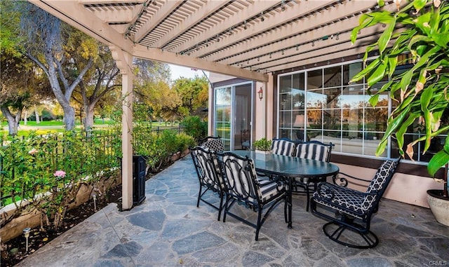 26800 Monet Ln, Valencia, CA 91355 - view of patio with outdoor dining area, fence, and a pergola
