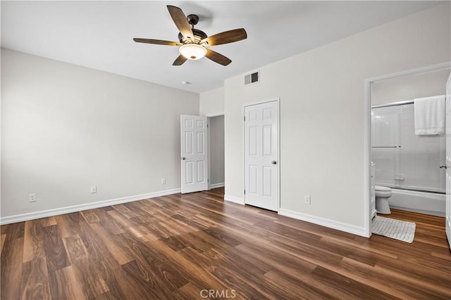 26800 Monet Ln, Valencia, CA 91355 - unfurnished bedroom with ensuite bath, baseboards, visible vents, and dark wood finished floors
