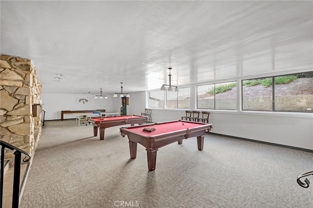 rec room featuring carpet floors, billiards, and a textured ceiling