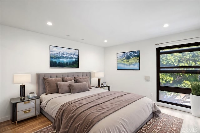 bedroom with light wood-type flooring