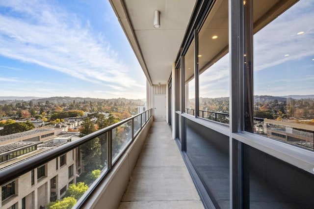 balcony featuring a mountain view