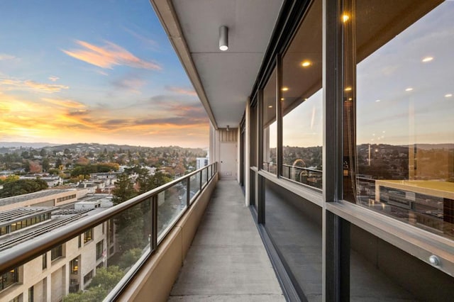 view of balcony at dusk