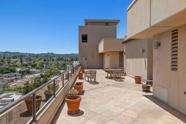 view of patio with a balcony