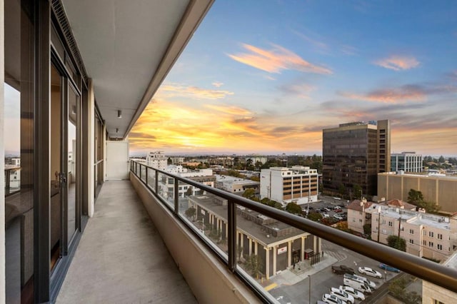 view of balcony at dusk