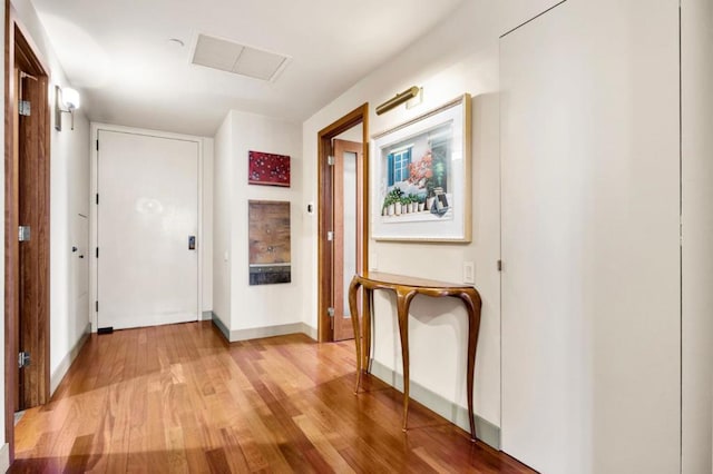 corridor featuring light wood-type flooring