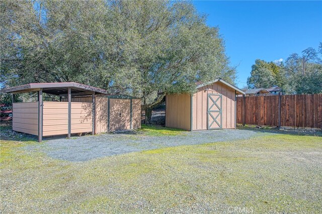 exterior space with a shed