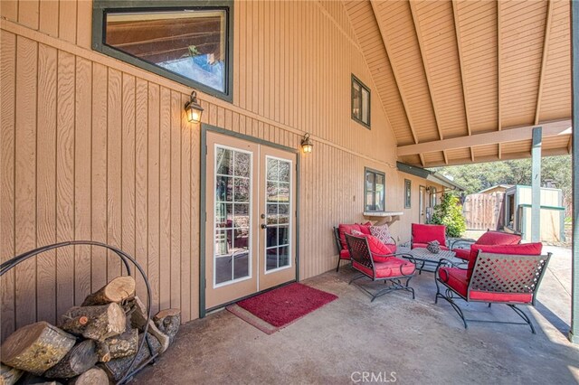 view of patio with french doors and an outdoor living space