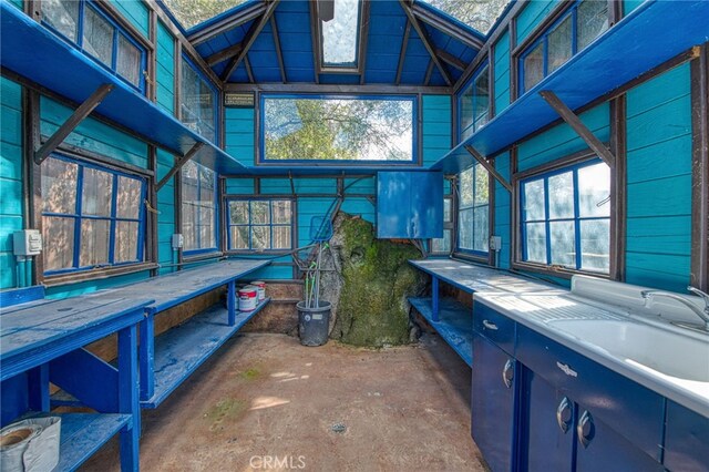 interior space with high vaulted ceiling and sink