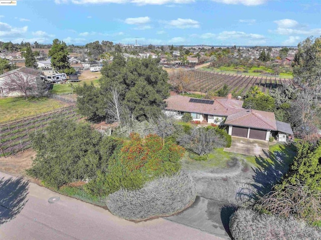 birds eye view of property featuring a rural view