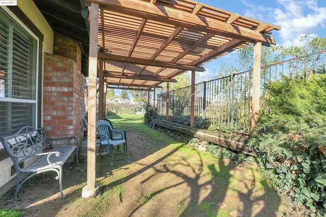 view of patio featuring a pergola