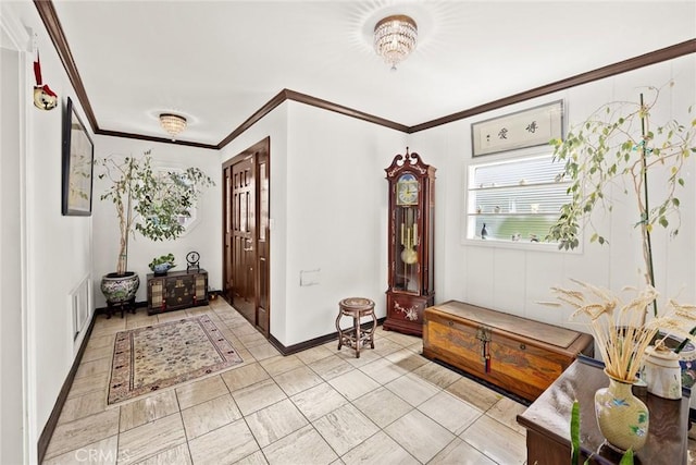 entryway featuring crown molding