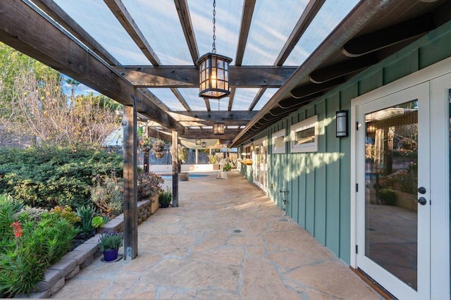 view of patio featuring a pergola and french doors