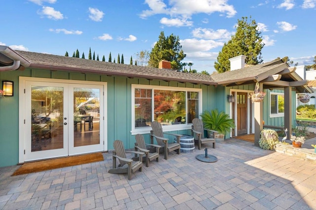 back of house featuring french doors and a patio area