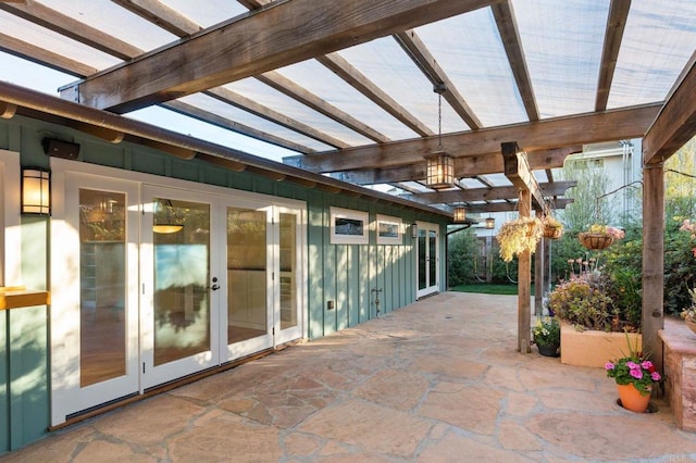 view of patio / terrace with french doors and a pergola