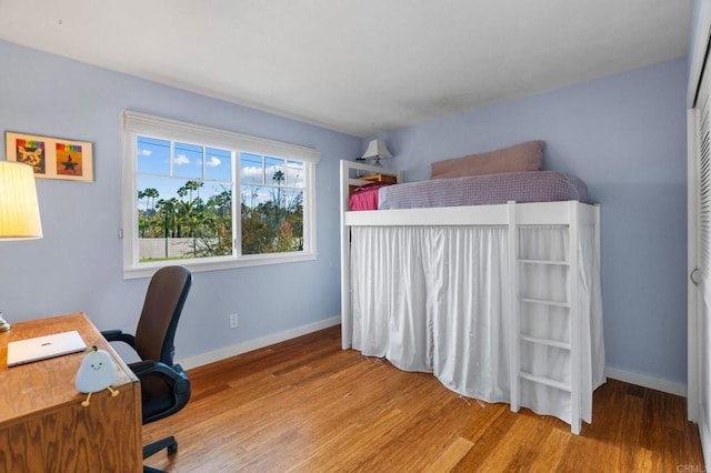 home office featuring hardwood / wood-style flooring