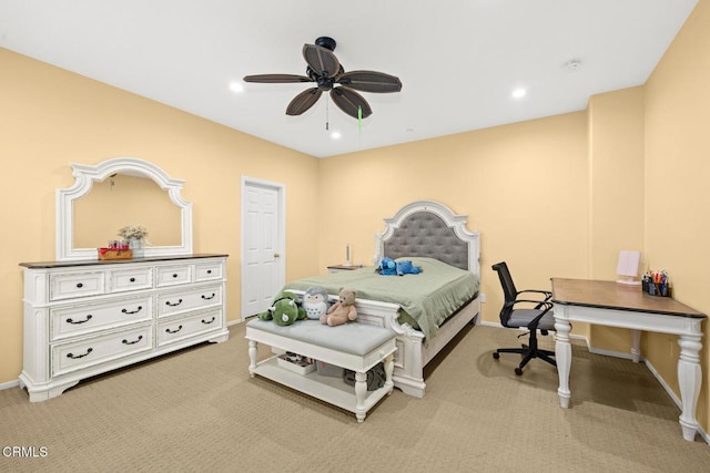 carpeted bedroom featuring ceiling fan