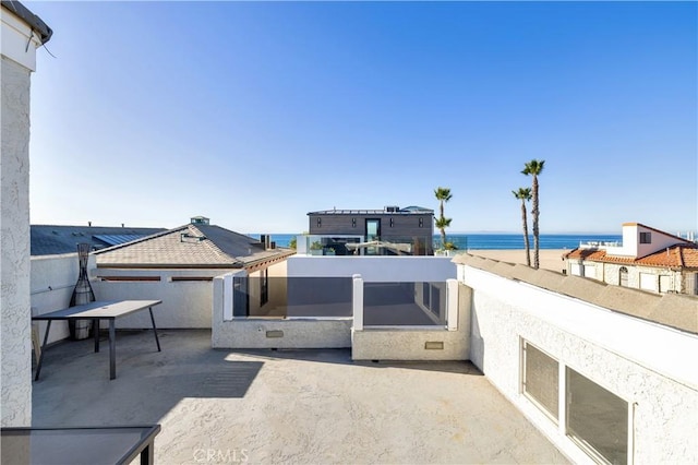 view of patio / terrace featuring a water view