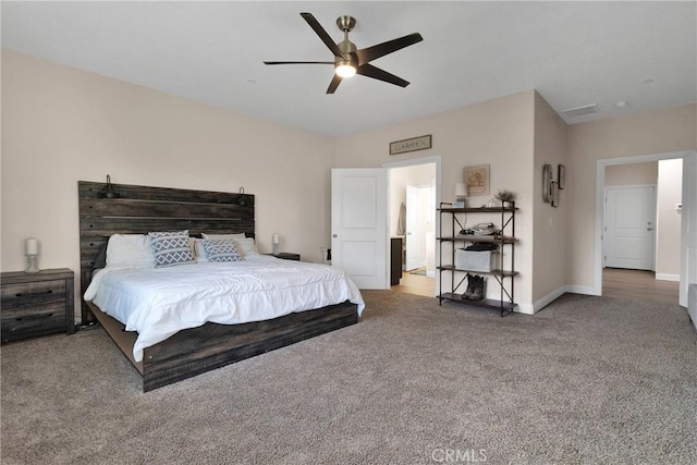 carpeted bedroom with ceiling fan