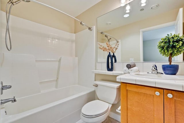 full bathroom with vanity,  shower combination, and toilet