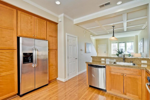 kitchen with pendant lighting, sink, coffered ceiling, stainless steel appliances, and light hardwood / wood-style flooring