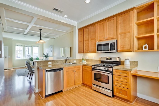 kitchen featuring pendant lighting, sink, light hardwood / wood-style flooring, appliances with stainless steel finishes, and coffered ceiling