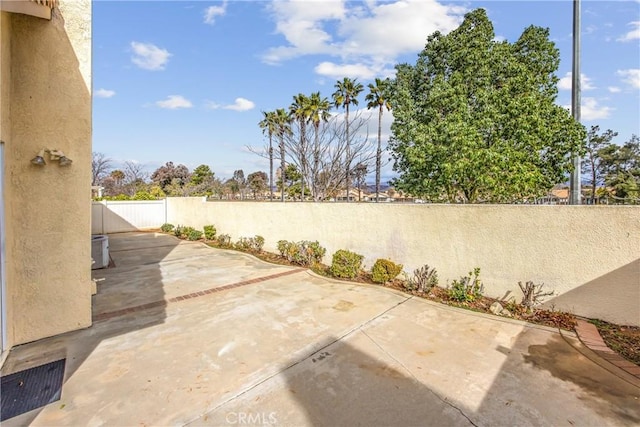 view of patio featuring a fenced backyard