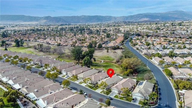 drone / aerial view featuring a mountain view