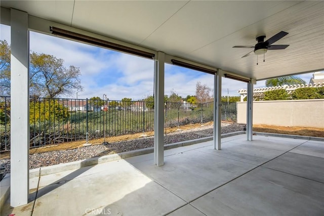 view of patio featuring ceiling fan